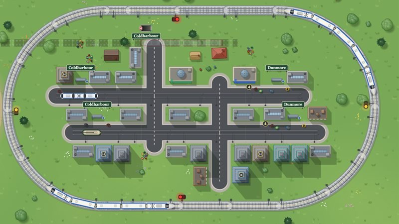 A town of office blocks and skyscrapers with two tram streets, ringed by a high-speed line